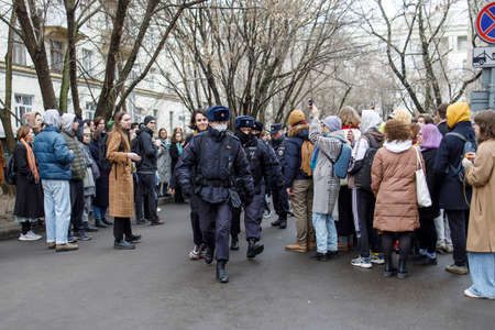 Moscow, Russia - 12 April 2022, People came to the court to support the arrested students in the case Doxa. Police arrest activistsのeditorial素材