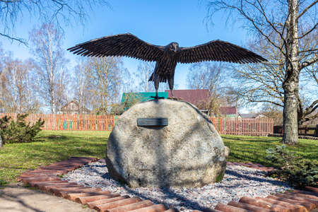 Staraya Ladoga, Russia - May 6, 2022: Sculpture bronze falcon on the Varyazhskaya street, oldest in Russia. This is a symbol of the coat of arms of Staraya Ladoga and old Russian princely familiesのeditorial素材