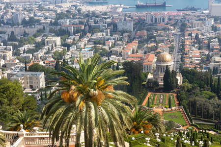 Haifa, Israel, June 26, 202 : view from the Louis Promenade on Mount Carmel to the Bahai Temple, the downtown and port of Haifa city in Israelの写真素材