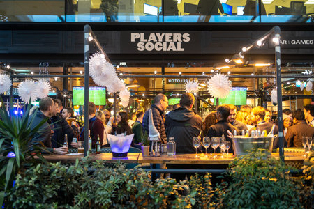 LONDON, ENGLAND - August 11 2022 People are sitting in a street cafe