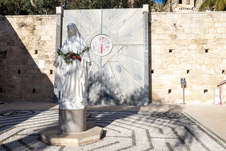 Nazareth, Israel - December 2022: A beautiful sculpture of Virgin Mary at Basilica of the Annunciation. One of the sculptures of Mary offered by different nationsのeditorial素材