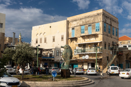 Acre, North District, Israel - January 12, 2023: Seahorse Statue in the Old City of Akko during a cloudy day.のeditorial素材