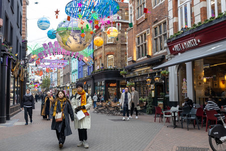 London, UK - 10 December 2022, Carnaby Street Christmas decorations this year are a compilation of the best from the past 25 years and incorporate elements of 14 different themesのeditorial素材
