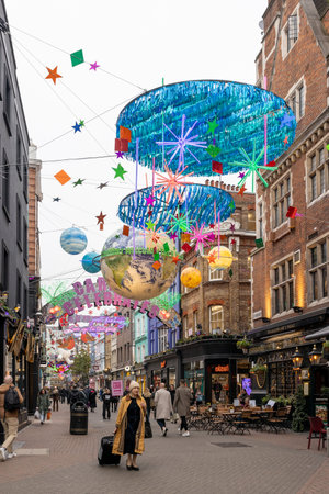 London, UK - 10 December 2022, Carnaby Street Christmas decorations this year are a compilation of the best from the past 25 years and incorporate elements of 14 different themesのeditorial素材