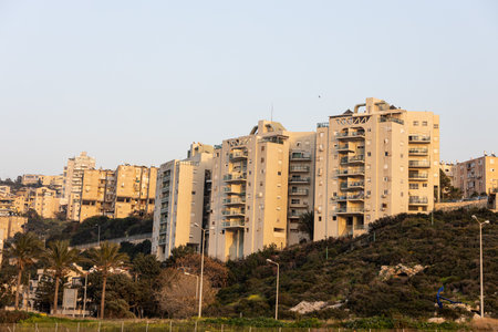 Haifa, Israel - March 1, 2023, High-rise buildings on a hill in the Shprintsak district at sunsetのeditorial素材