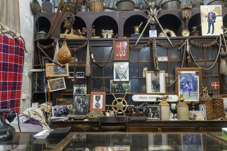 Acre, Israel -March 2023, Spice shop in the market. The wall is decorated with photographs of the former owners. Spices in glass jars.のeditorial素材