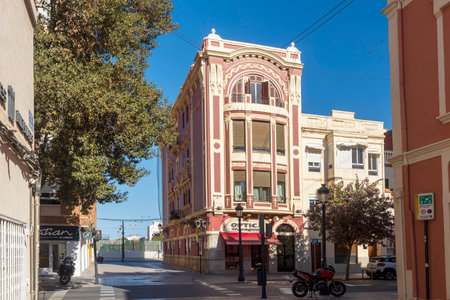Valencia, Spain - 24 March 2024: Old multi-colored houses in the Cabanyal district, considered disadvantaged. Street Carrer de Carles Rosのeditorial素材