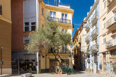VALENCIA, SPAIN - May 2, 2024: Narrow streets with colorful houses in the old town. Street de santa elena valenciaのeditorial素材