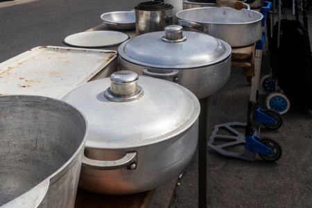 Aluminum cookware for sale at a street marketの写真素材