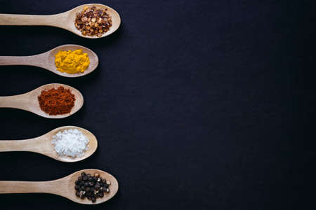 Spoon and spice border with negative spaceの写真素材