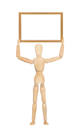 Wooden mannequin holding blank boardの写真素材