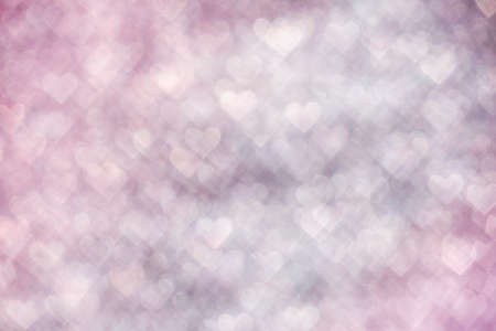 Background of abstract pink heart bokehの写真素材
