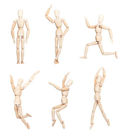 Wooden mannequins standing sitting running dancing jumpingの写真素材
