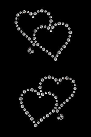 3D illustration render of diamonds in the shape of heartsの写真素材