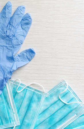 Surgical gloves and masks with negative space for wording in portrait modeの写真素材