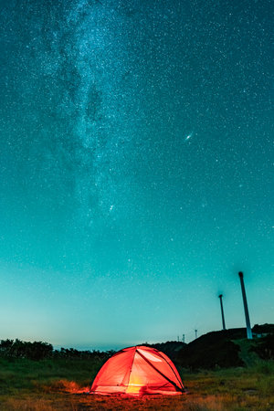 Observing galaxy in the mountain of Xianning China while campingの写真素材