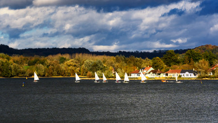 Sailing boats on the lake of center park in Franceの写真素材