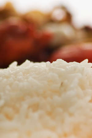 Oriental food, rice and chinese chicken in backgroundの写真素材