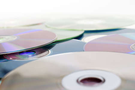 Close up of dvd discs as background, rainbow reflection