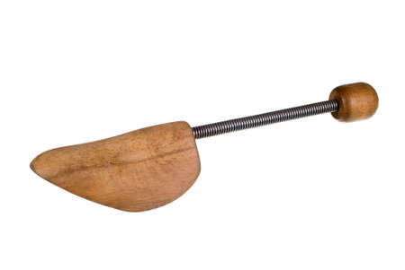 Wooden foot, shoe insert, isolated on the white backgroundの写真素材