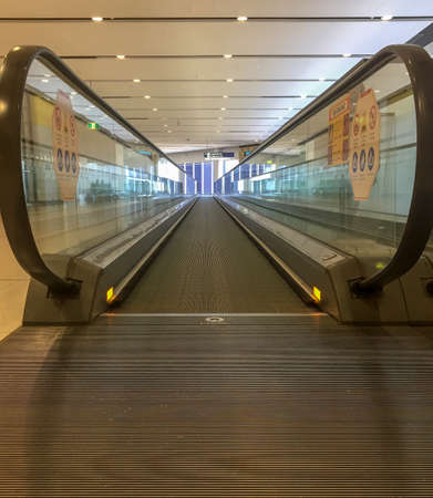 Low angle perspective view of a walkalator at the airportの写真素材