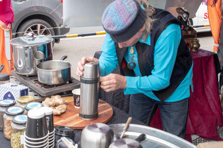 Barista prepares coffee at the Sandringham Street Festivalのeditorial素材