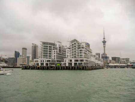 Auckland waterfront skyline on a bleak cloudy dayのeditorial素材