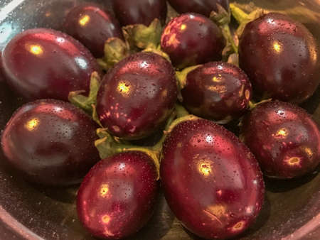 Aubergines close up with warm highlights taken from a high angleの写真素材
