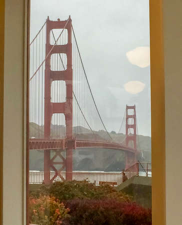 Golden Gate Bridge San Francisco viewed from the nearby cafe windowの写真素材