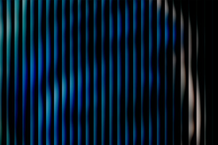 A striking abstract design showcasing elongated vertical stripes in shades of blue and black, with a smooth gradient and depth. The image exudes a modern, futuristic feel suitable for contemporary art, technology themes, or stylish backgrounds.の写真素材