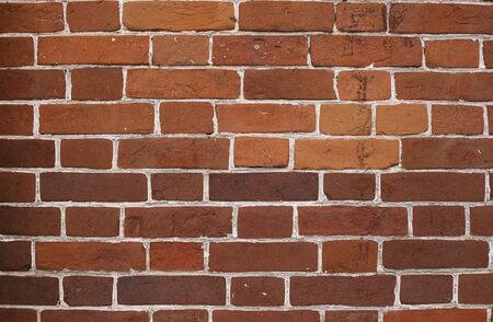 Brick wall with white seams, a beautiful texture.