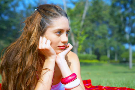 portrait of nice redhead girl in summer environmentの写真素材