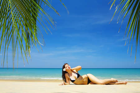 view of a nice  young female in tropical environmentの写真素材