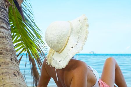 View of nice woman having fun on tropical beachの写真素材