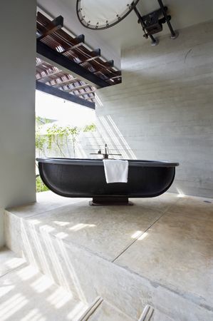 View of summerhouse terrace with black bath in a middleの写真素材