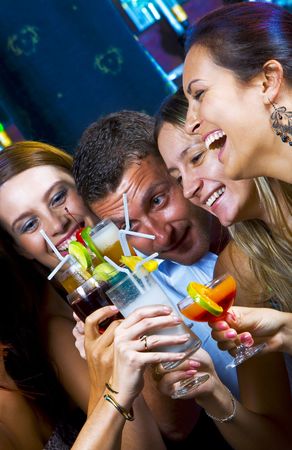 Portrait of young attractive people having fun in night clubの写真素材