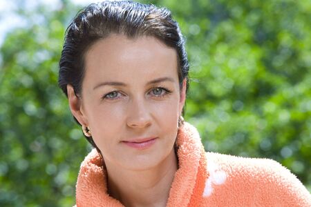 Portrait of nice brunette in summer  environmentの写真素材