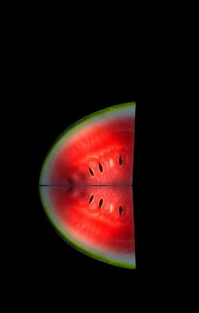 View of fresh watermelon slice on black backの写真素材