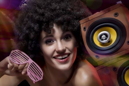 Close up portrait of beautiful woman having good time in nightclub environmentの写真素材