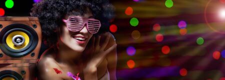 Close up portrait of beautiful woman having good time in nightclub environmentの写真素材