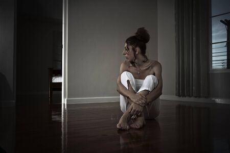 portrait of young woman in domestic environmentの写真素材