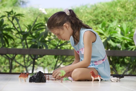 portrait of little girl   having good time in summer environmentの写真素材