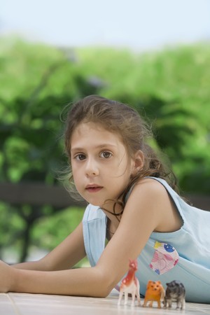 portrait of little girl   having good time in summer environmentの写真素材