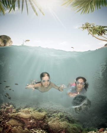 Portrait of little kids having good time in summer environmentの写真素材