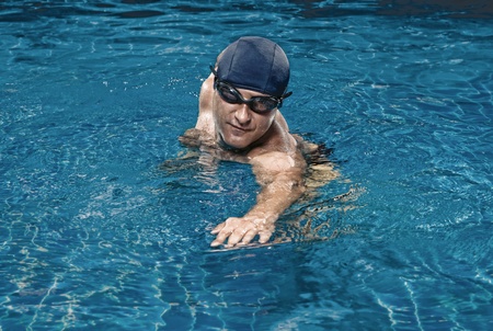 portrait of young man in swimming pool