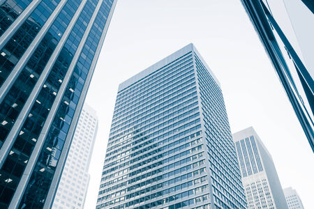 View of modern blue colored building made of glass 