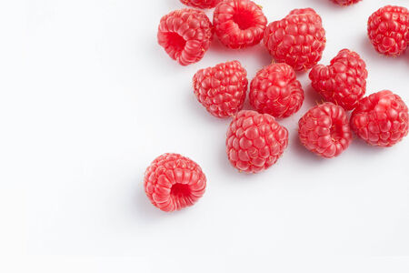 close up view of nice fresh raspberry on white back