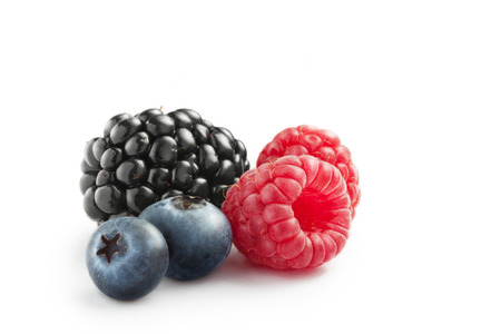 close up view of nice fresh berries on white  backgroundの写真素材