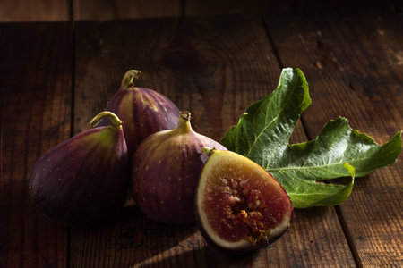 close up view of fresh figs on color backの写真素材
