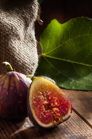 close up view of fresh figs on color backの写真素材